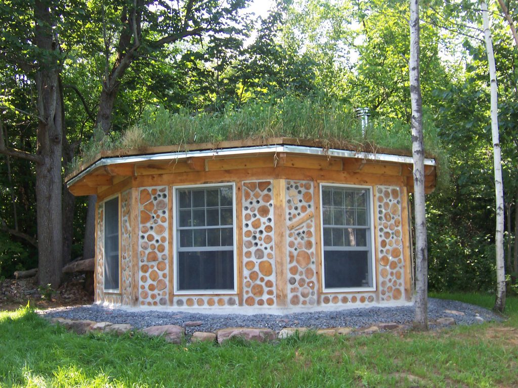 Our Stoneview guest house, an octagon, has a long diameter of 21 feet and 256 SF of actual usable area inside. It cost about $5000 to build in 2004, but would probably be double that amount today.