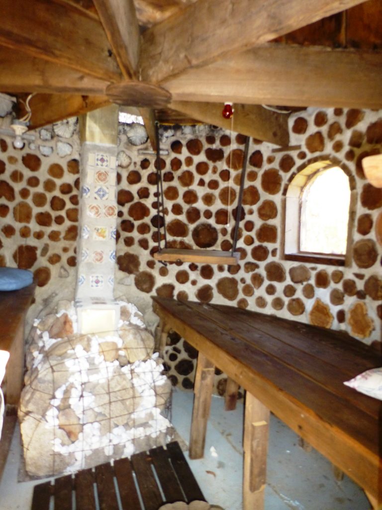 Inside the sauna near New Paltz. The exterior diameter is about 11 feet, and the walls are eight inches thick. Five or six people can sauna together.